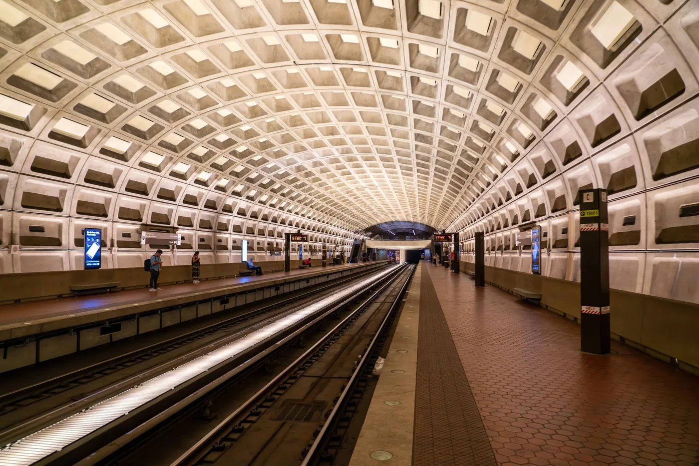 Elegant underground metro station in Washington D.C. showcasing modern design with geometric arches.