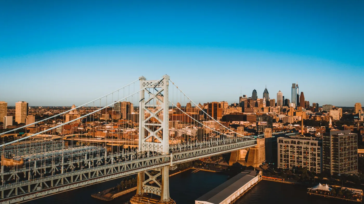 Drone view of city landmark Benjamin Franklin Bridge over Delaware River connecting cities of Philadelphia in America