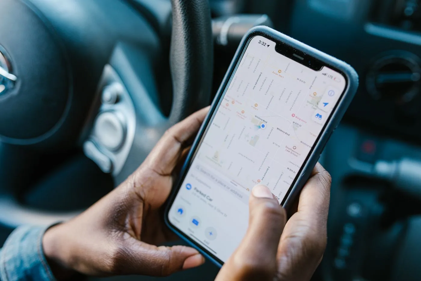 Commuter checking traffic on their phone before leaving for work