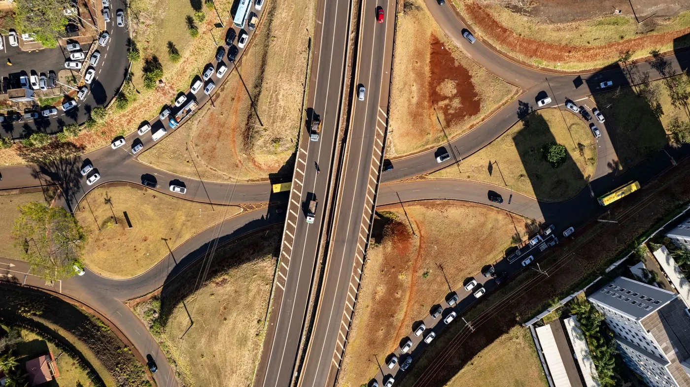 Aerial shot of a bustling highway interchange in Londrina, Brazil.